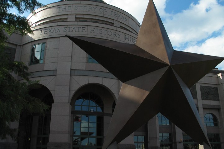 Round building with a big bronze star in front